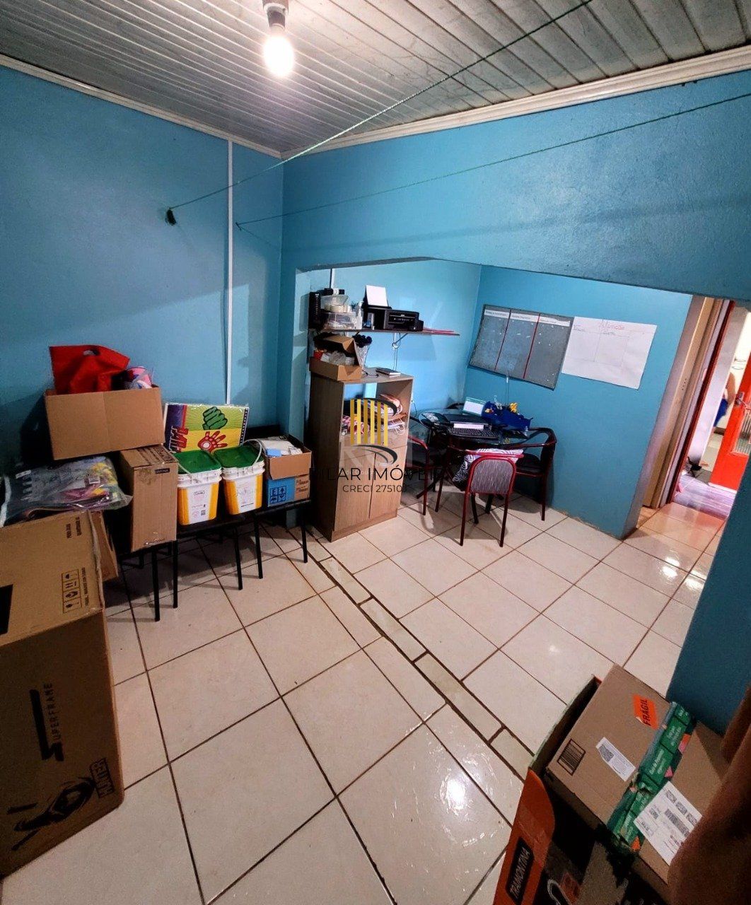 Casa com 3 quartos, 1 suíte, vaga de garagem, varanda, no bairro Hilda, Cruz Alta/RS
