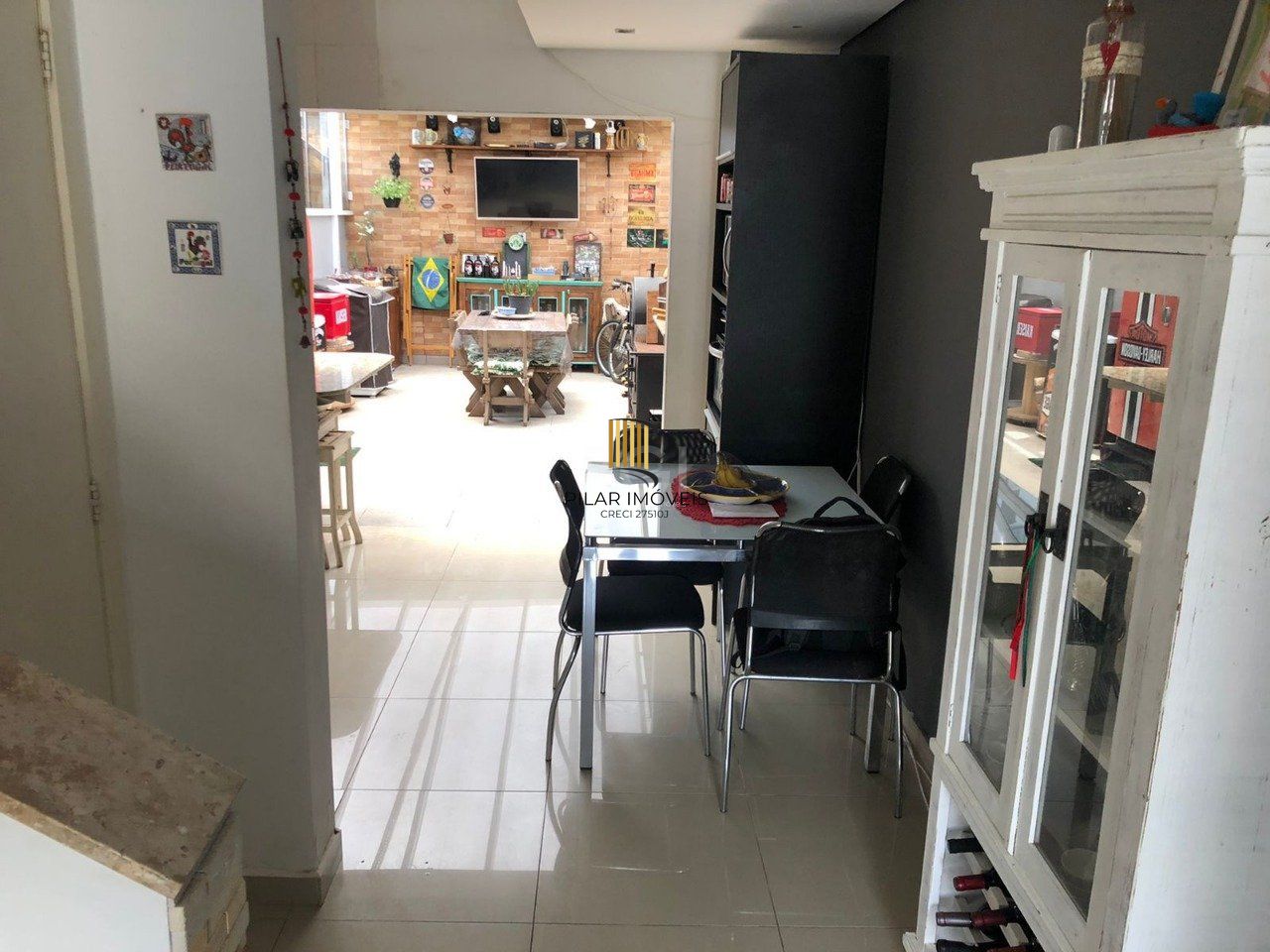 Casa com 3 dormitórios 2 suítes, área gourmet, vaga de estacionamento,  Guarujá,  Porto Alegre RS 