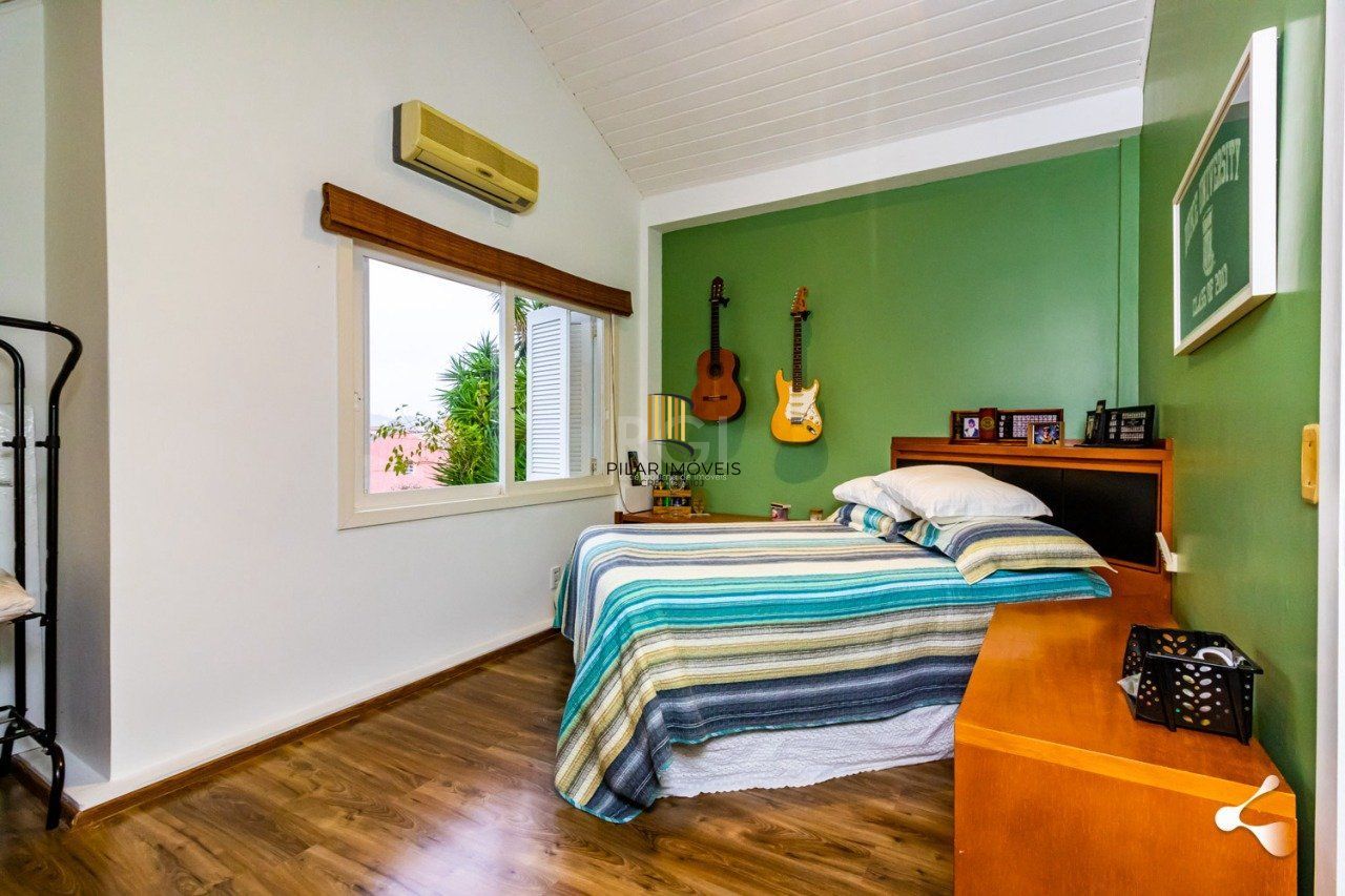 CASA 4 DORMITÓRIOS COM GARDEM NO GUARUJA - PORTO ALEGRE - RS