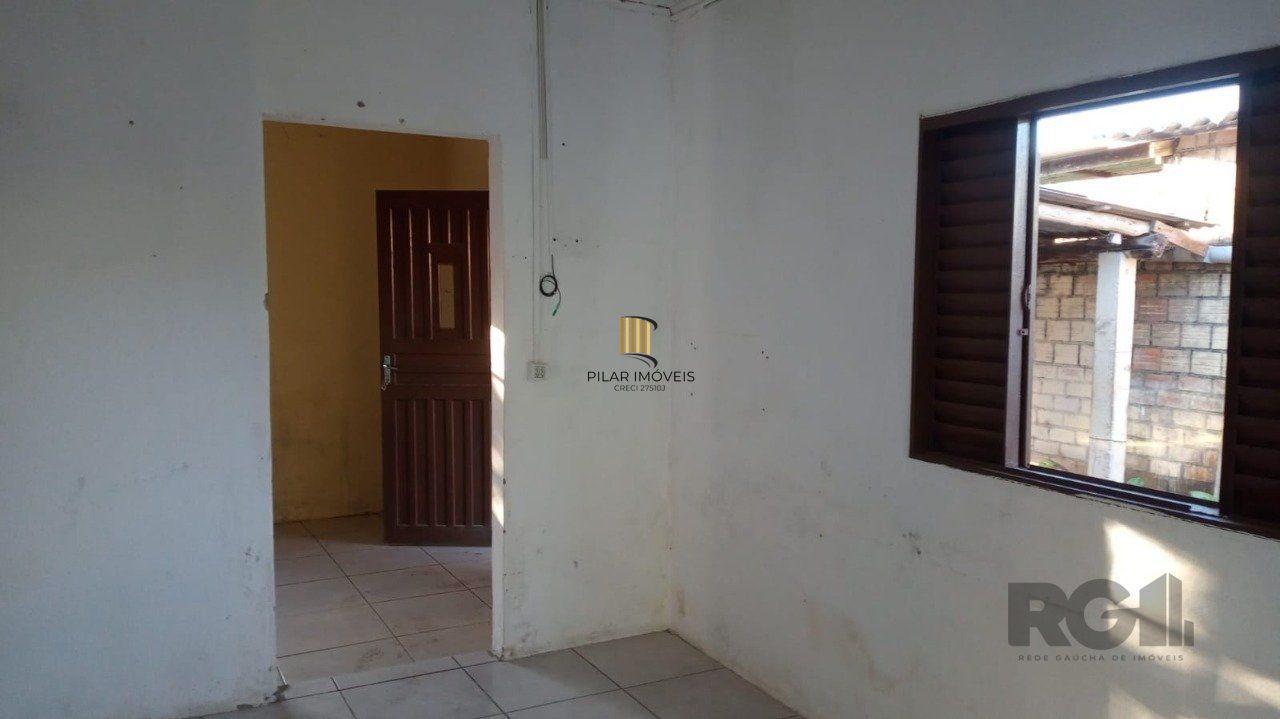 Casa à venda 2 dormitórios 3 vagas no Bairro Lami Porto Alegre RS