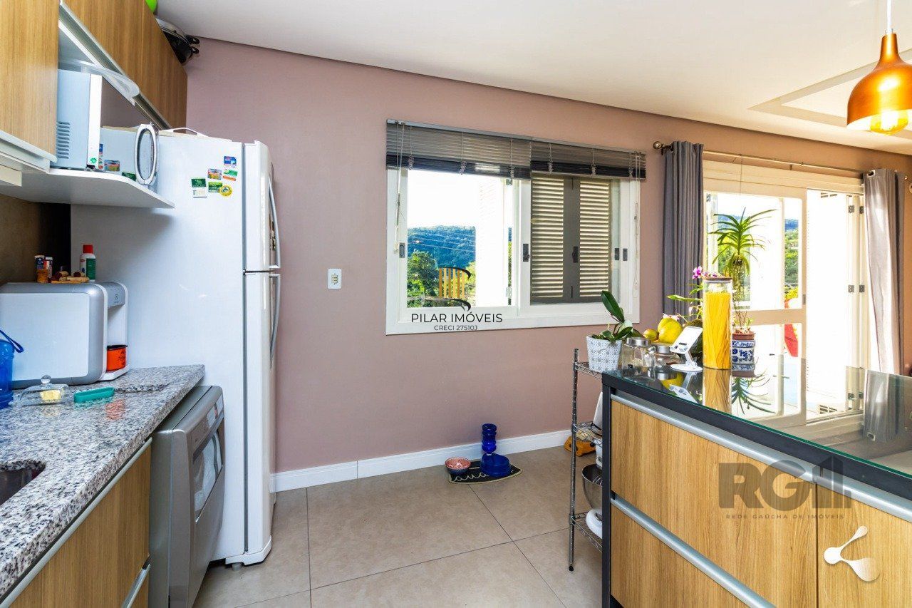 Casa de Condomínio 3 dormitórios no bairro Vila Nova