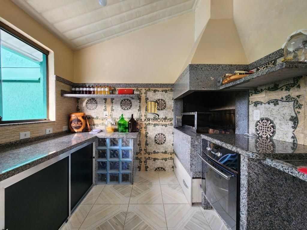 Casa 3 dormitórios, 1 suite, lareira, 2 vagas de garagem, piscina, bairro Mariápolis, Osório-RS