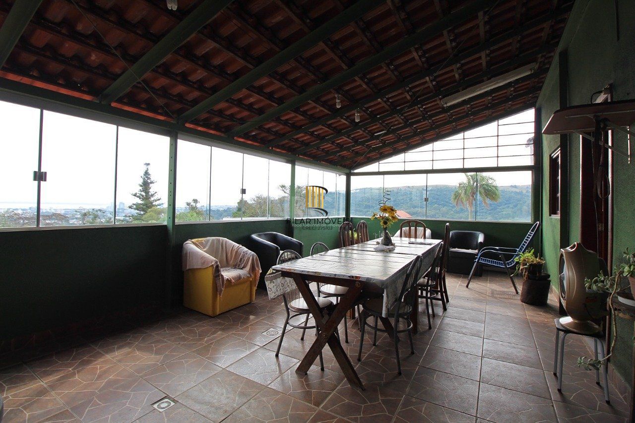 Casa para Venda - 339m², 3 dormitórios, 2 vagas - Vila Nova, Porto Alegre