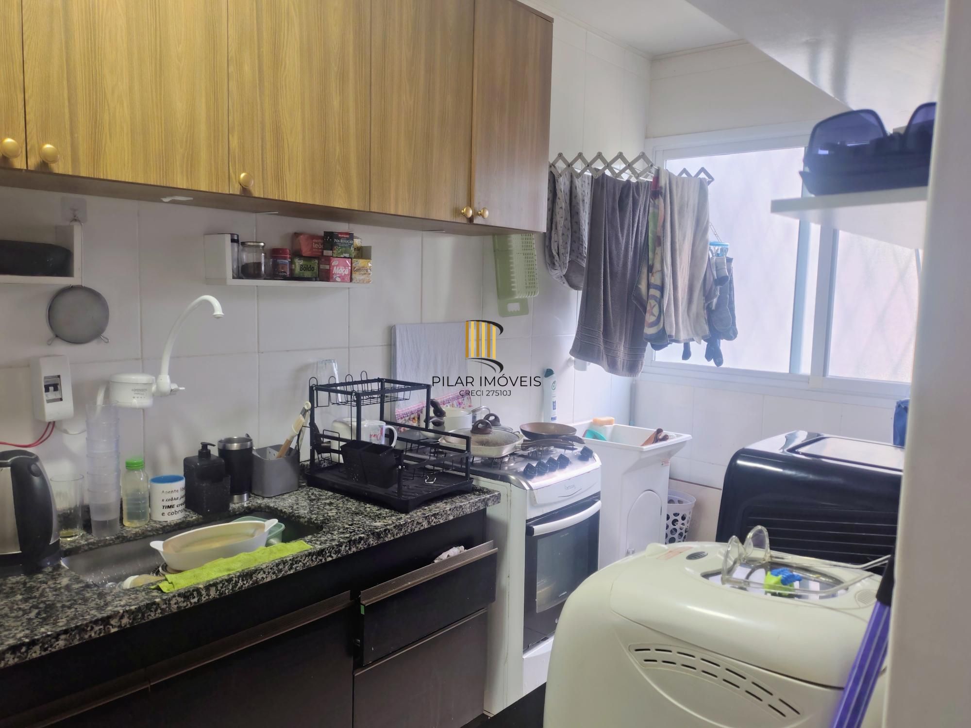 Apartamento dois dormitórios com vaga rotativa Santo Antônio - Porto Alegre