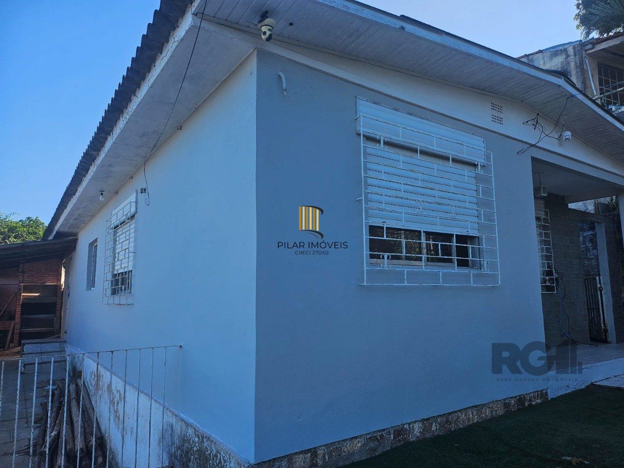 Terreno com casa com 3 quartos, vaga de garagem, no bairro Ipanema, Porto Alegre/RS