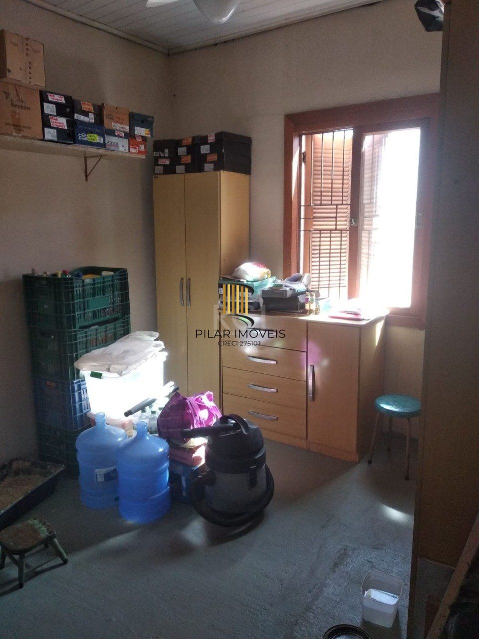 Casa 2 dormitórios, sala, banheiro garagem coberta, terreno 694m² bairro Camaquã, Porto Alegre/RS