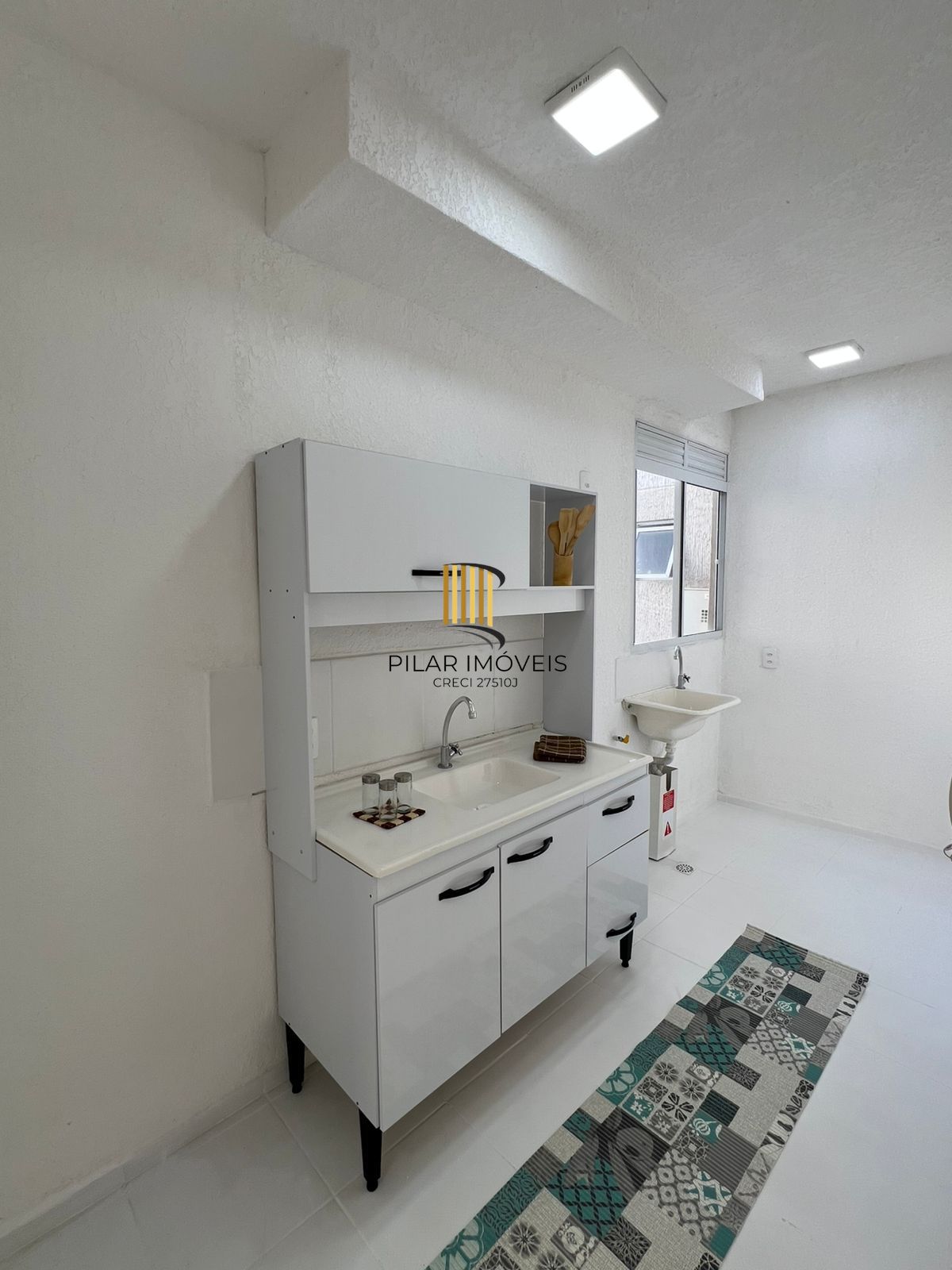 Apartamento Térreo com 02 quartos e 01 vaga no Bairro Restinga em Porto Alegre