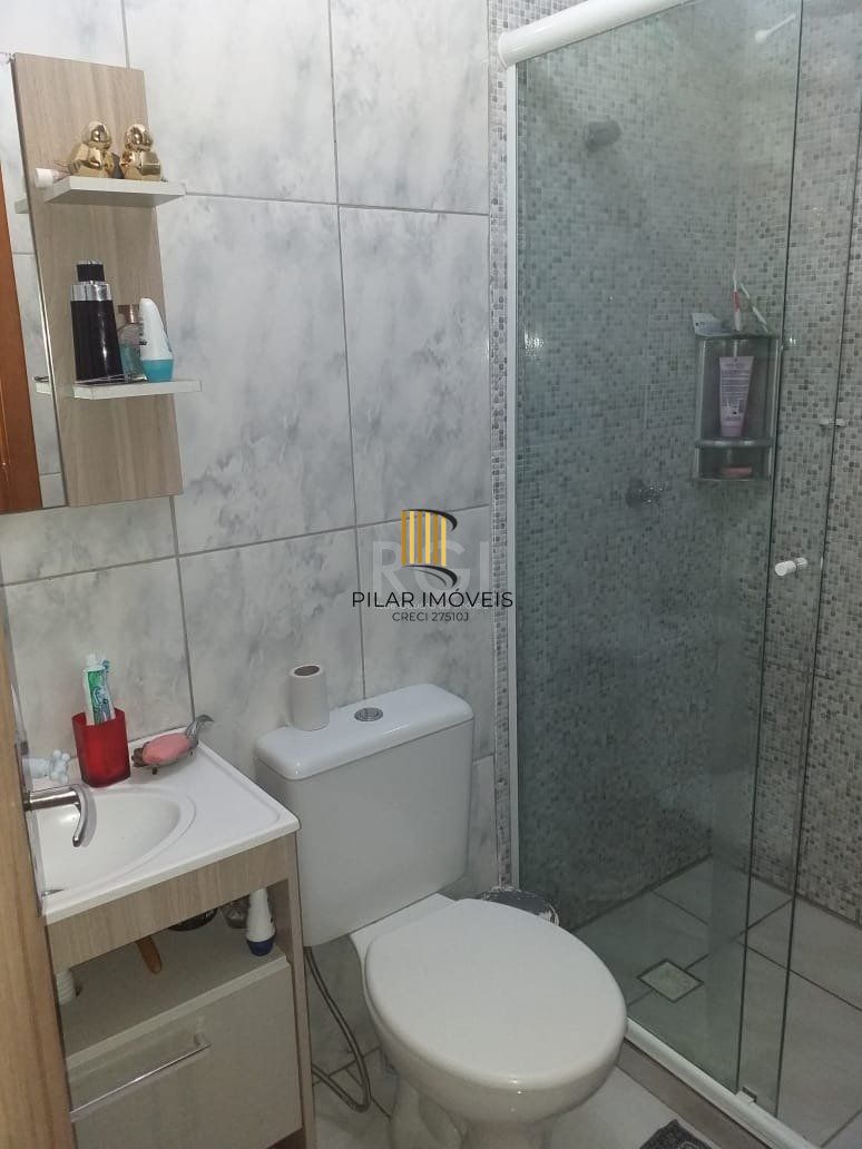 Casa com 2 quartos, banheiro, área de serviço, cozinha, vaga de garagem, no bairro Aberta dos Morros/RS