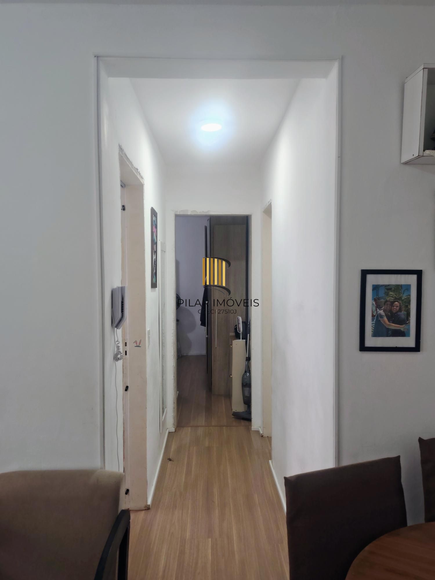 Apartamento dois dormitórios com vaga rotativa Santo Antônio - Porto Alegre