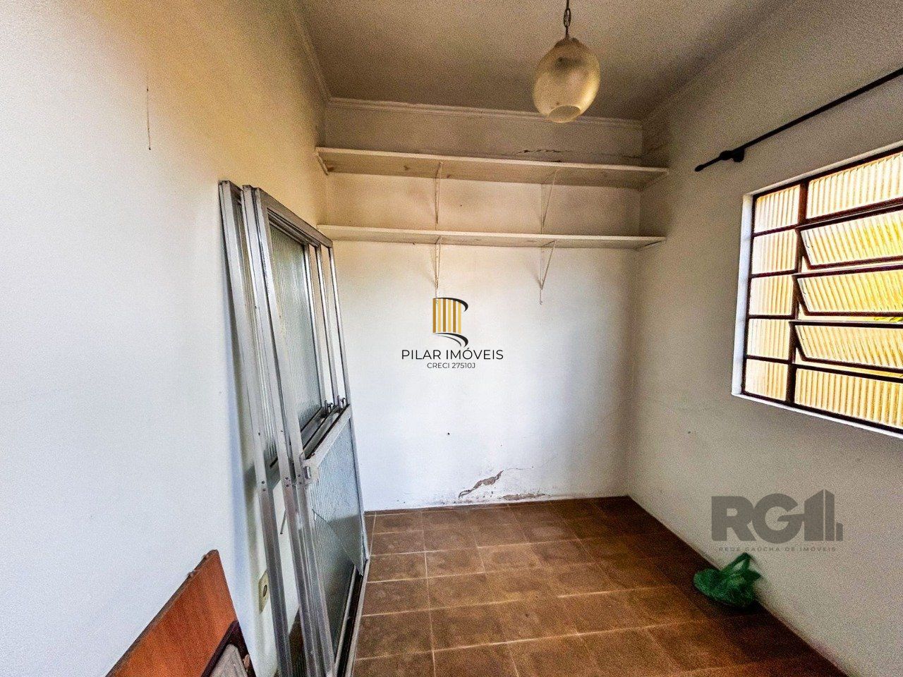 Casa de 3 dormitórios, 1 suíte, garagem fechada, churrasqueira, no bairro Cavalhada Porto Alegre/RS