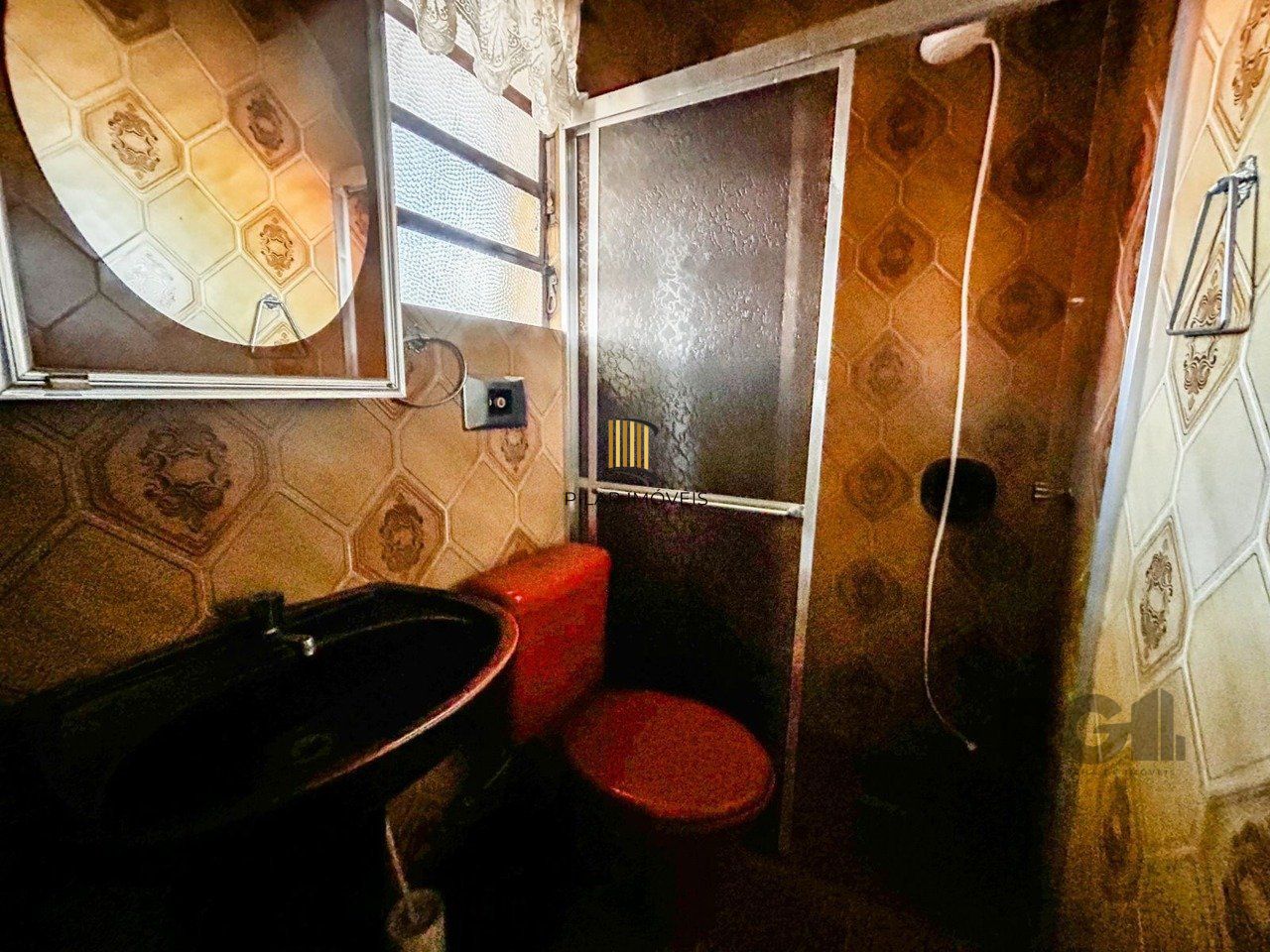 Casa de 3 dormitórios, 1 suíte, garagem fechada, churrasqueira, no bairro Cavalhada Porto Alegre/RS