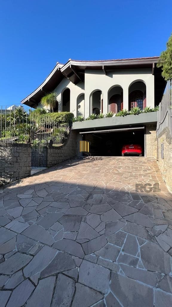 Casa de Condomínio 4 dormitórios no bairro Nonoai