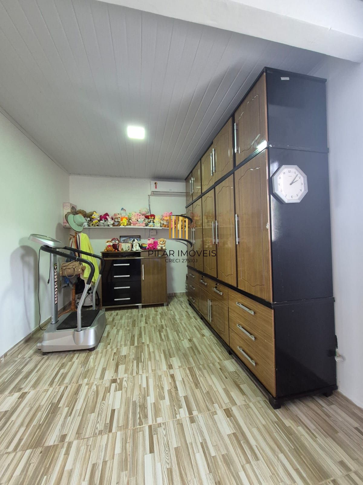 Belíssima casa de 2 dormitórios com um amplo pátio na cidade de Passo Fundo