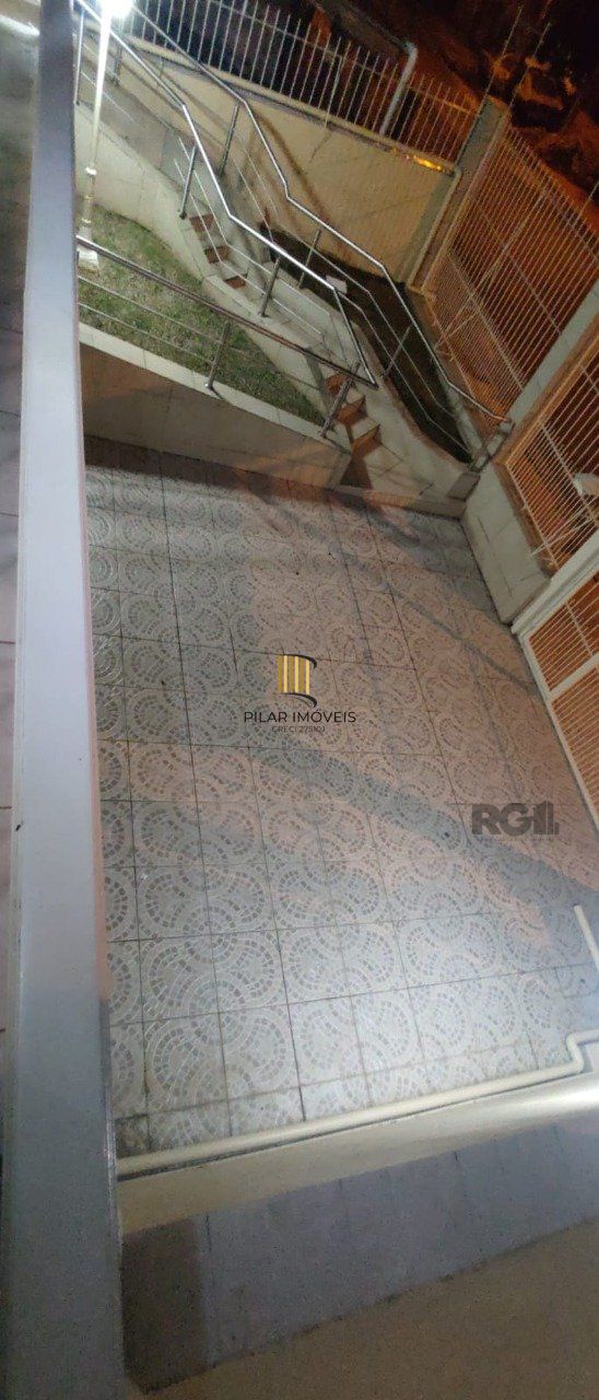 casa com 4 dormitórios, sendo 1 suíte, garagem para dois carros fechada, no bairro Santa Isabel em Viamão