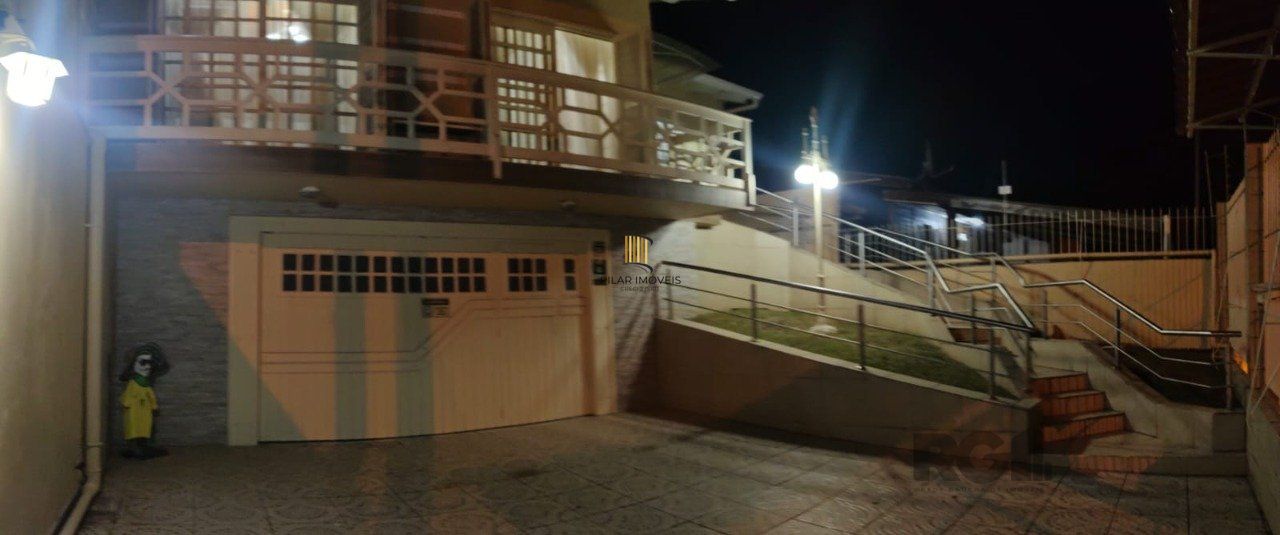 casa com 4 dormitórios, sendo 1 suíte, garagem para dois carros fechada, no bairro Santa Isabel em Viamão