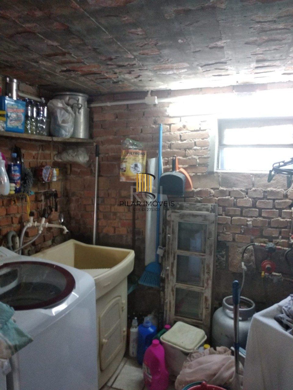 Casa 2 dormitórios, sala, banheiro garagem coberta, terreno 694m² bairro Camaquã, Porto Alegre/RS