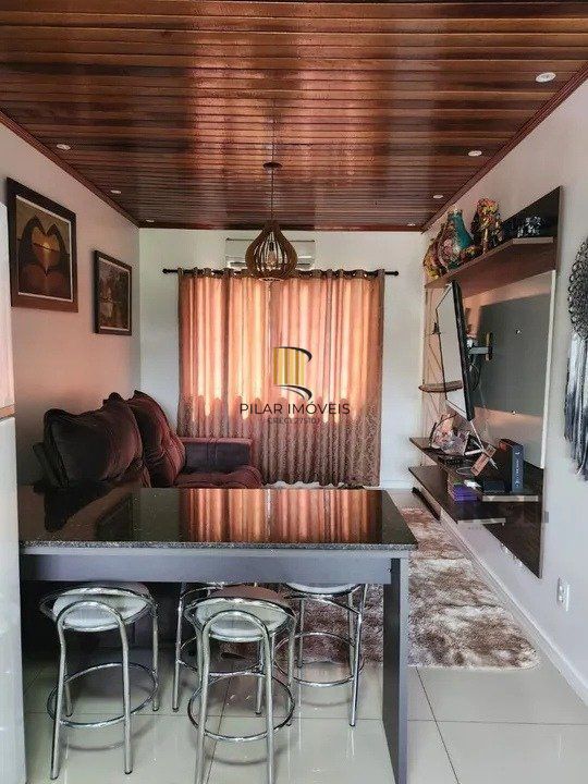  Casa com 4 quartos, 1 suíte, 7 vagas de garagem, churrasqueira -  97,32m² no bairro Jardim Carvalho, Porto Alegre/RS