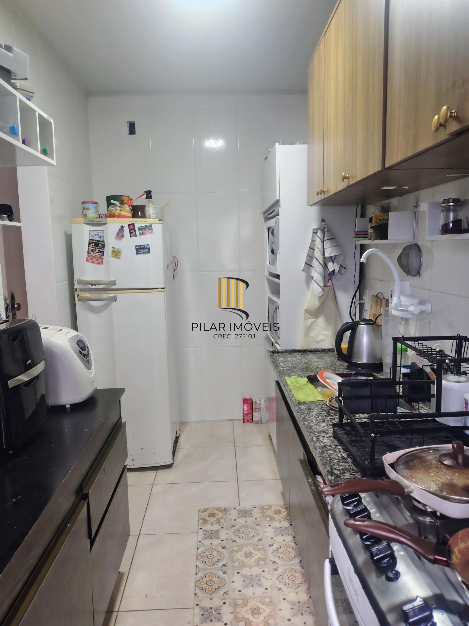 Apartamento dois dormitórios com vaga rotativa Santo Antônio - Porto Alegre