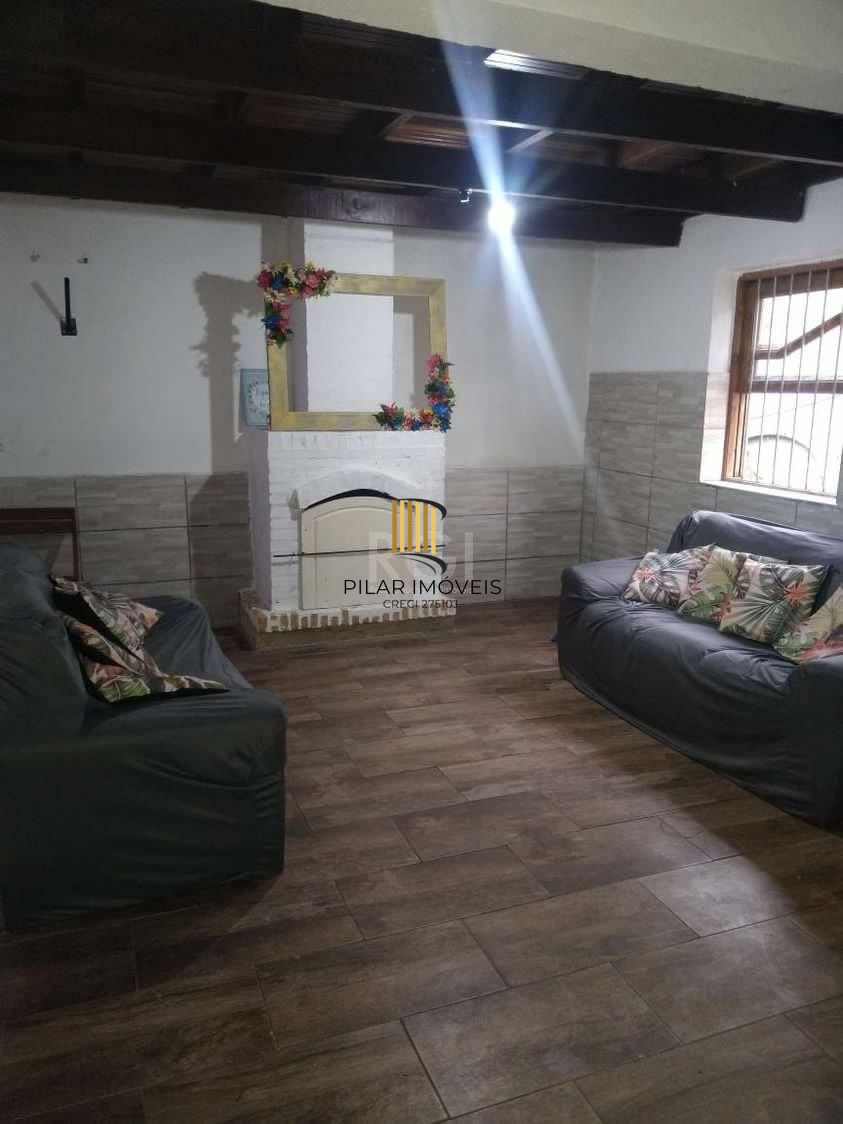 Casa com 3 dormitórios no bairro Olaria em Canoas