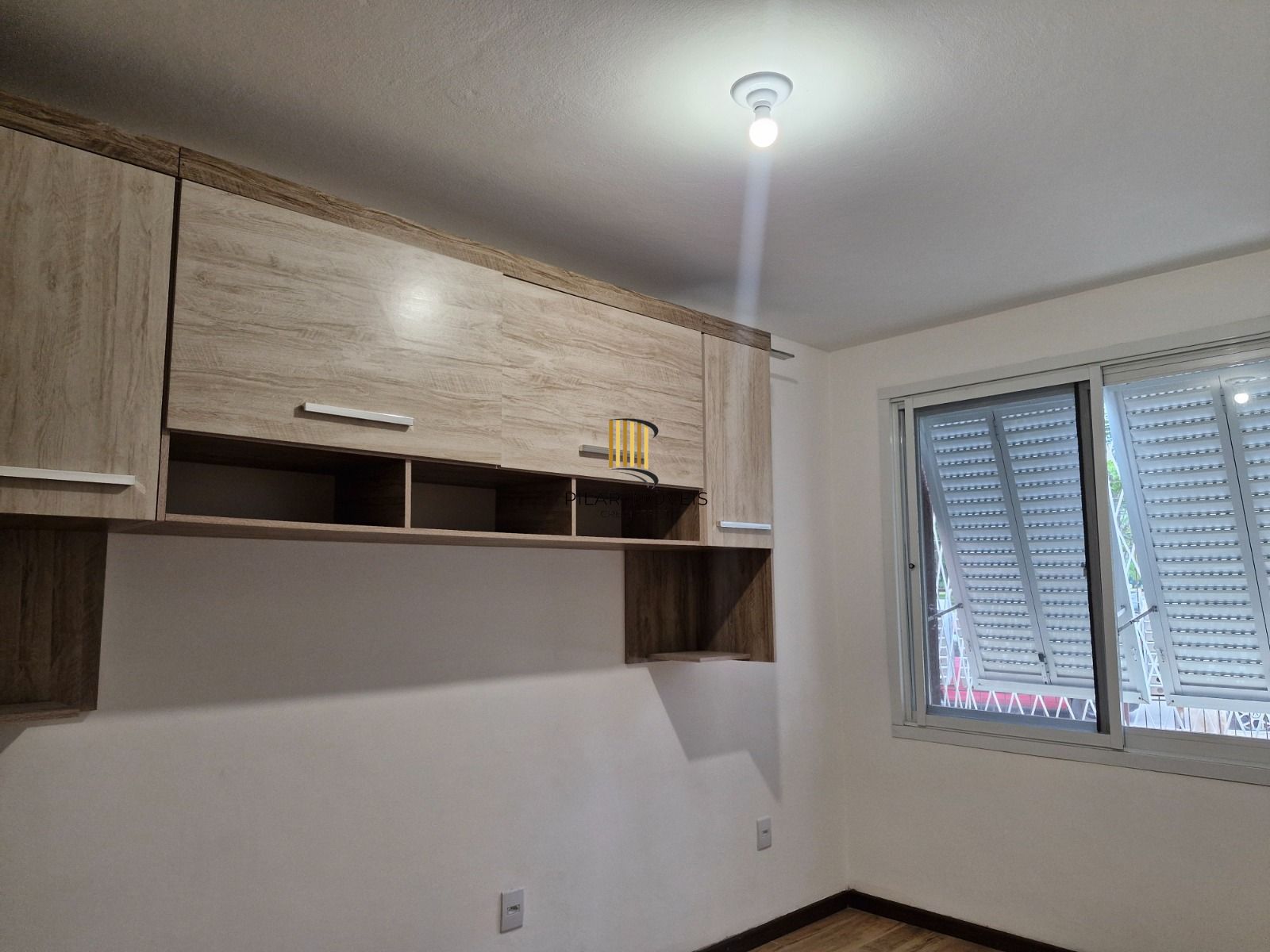 Apartamento de 2 dormitórios com vista para o Marinha no bairro Menino Deus em Porto Alegre/RS