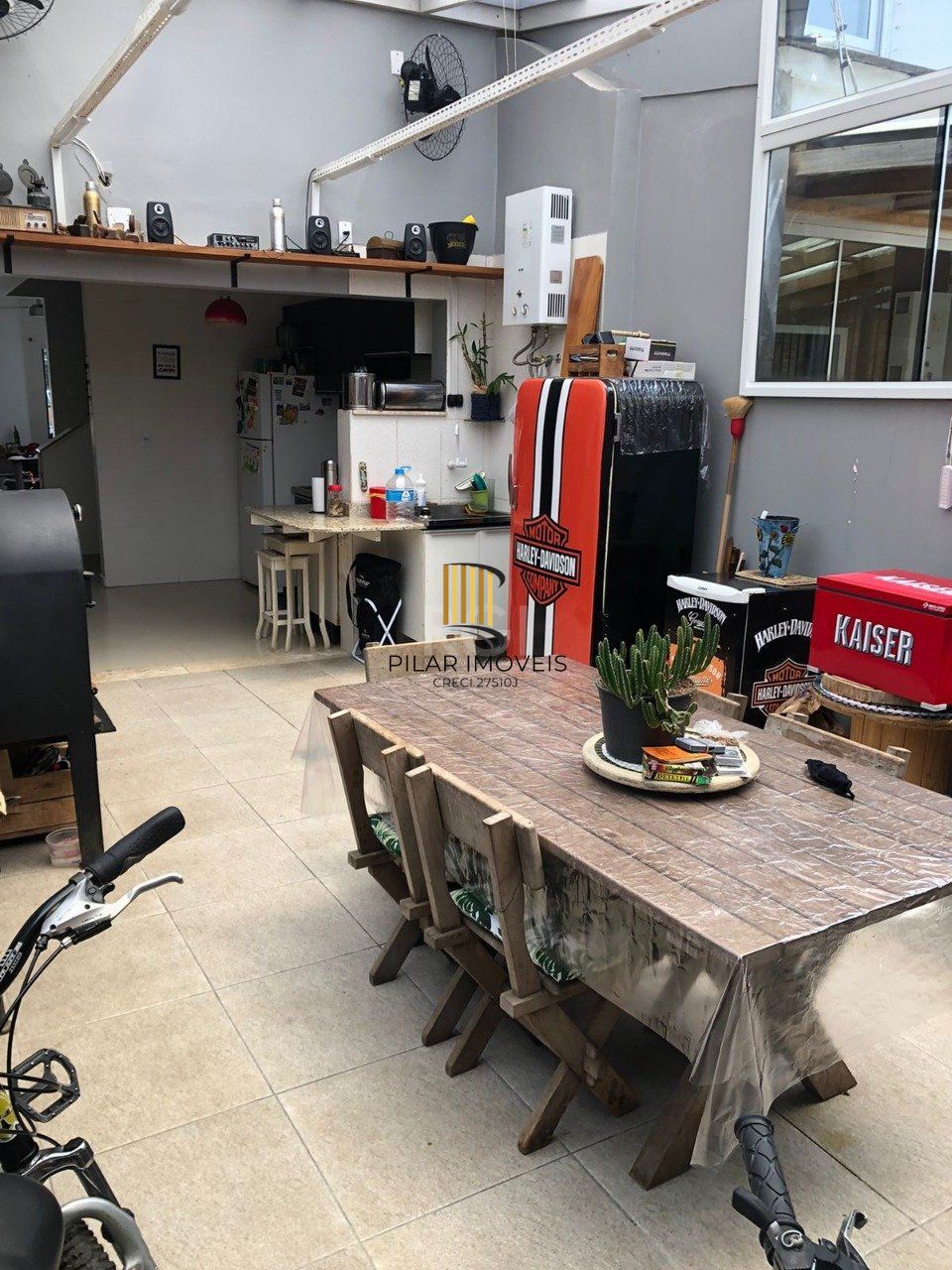 Casa com 3 dormitórios 2 suítes, área gourmet, vaga de estacionamento,  Guarujá,  Porto Alegre RS 