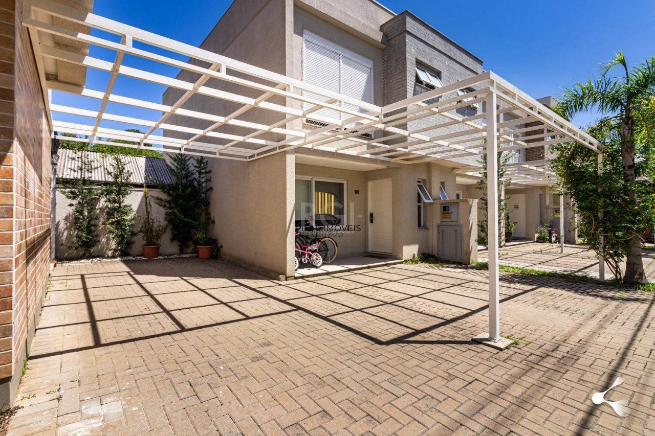 Casa Condominio para Venda - 142,39m², 3 dormitórios, sendo 1 suites, 2 vagas - Vila Nova, Porto Alegre
