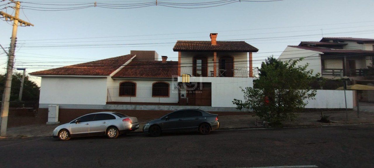 Casa de 4 dormitórios no bairro Parque Santa Fé - Pilar Imóveis