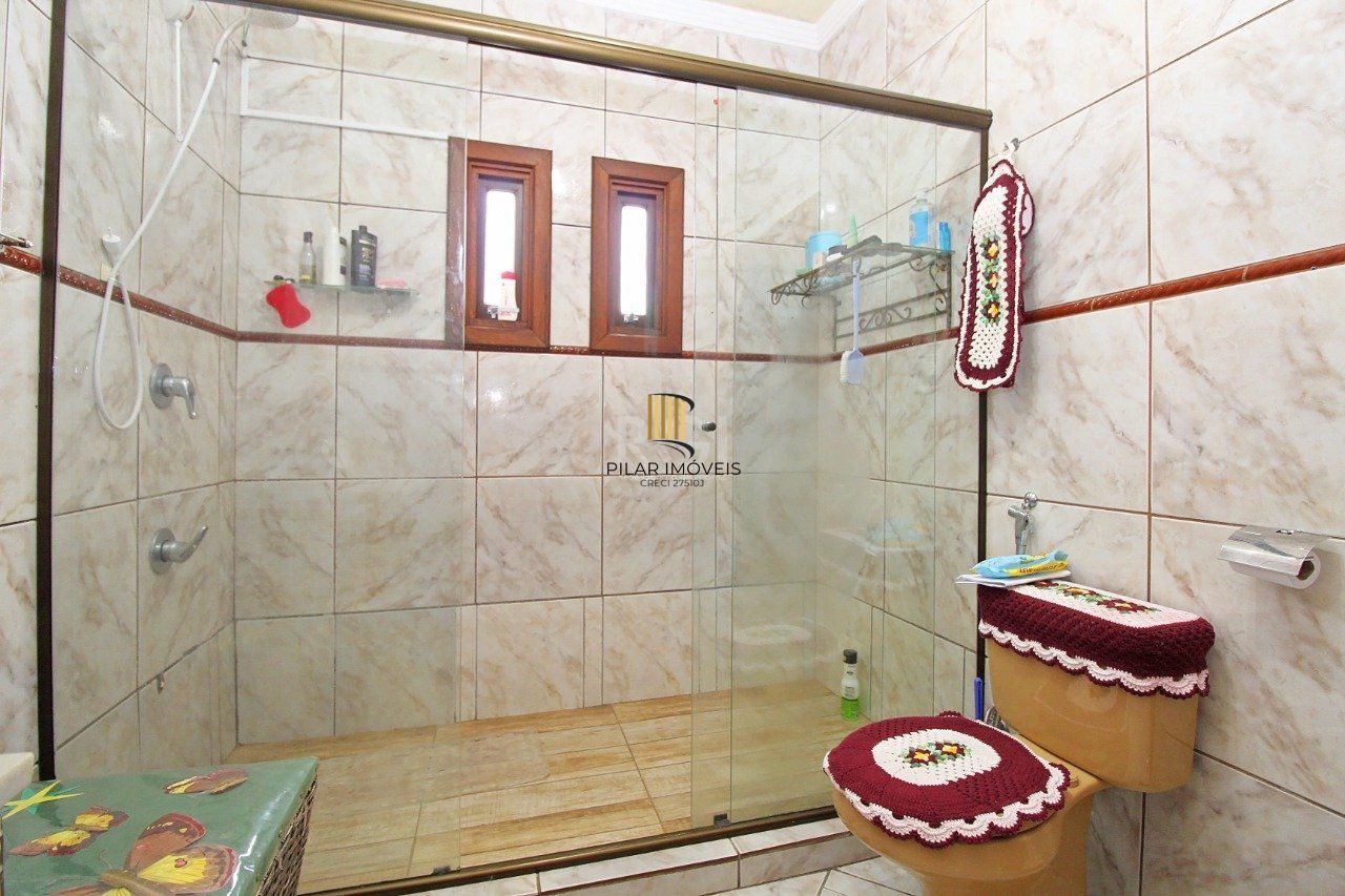 Casa para Venda - 339m², 3 dormitórios, 2 vagas - Vila Nova, Porto Alegre
