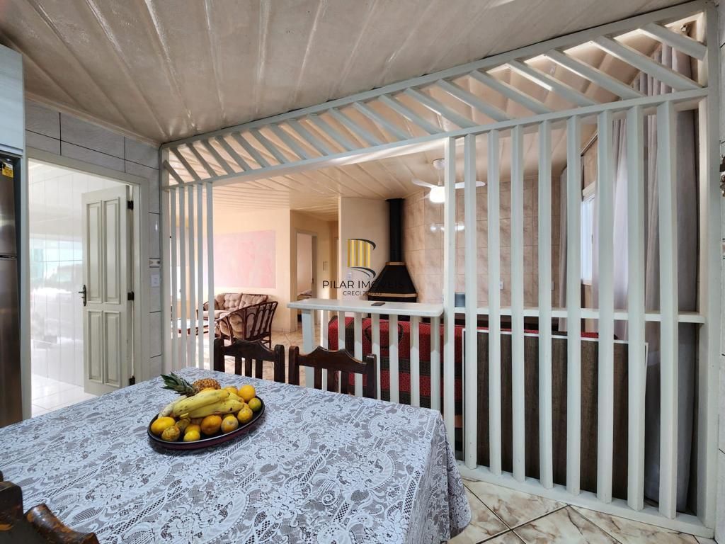 Casa 3 dormitórios, 1 suite, lareira, 2 vagas de garagem, piscina, bairro Mariápolis, Osório-RS