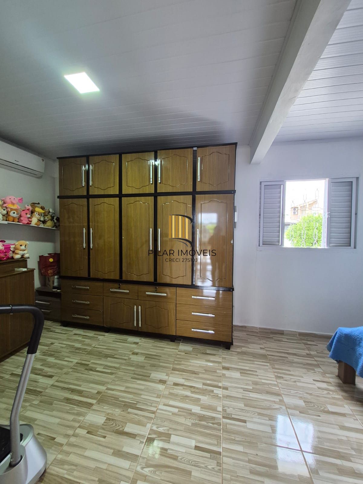 Belíssima casa de 2 dormitórios com um amplo pátio na cidade de Passo Fundo