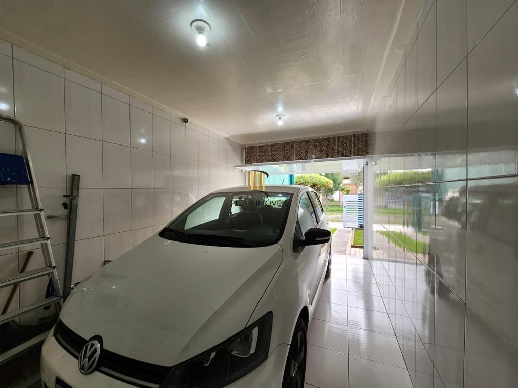 Casa 3 dormitórios, 1 suite, lareira, 2 vagas de garagem, piscina, bairro Mariápolis, Osório-RS