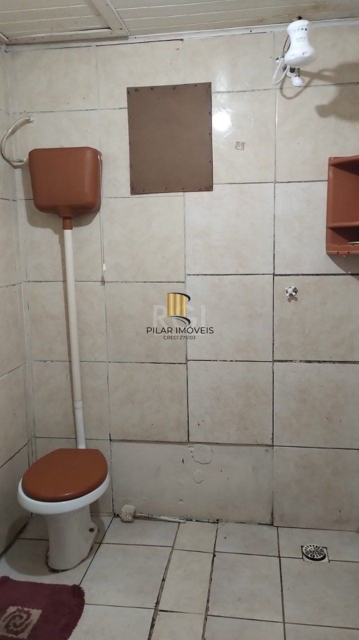 Terreno com 3 casas no pátio bairro  São Francisco TRAMANDAÌ/RS