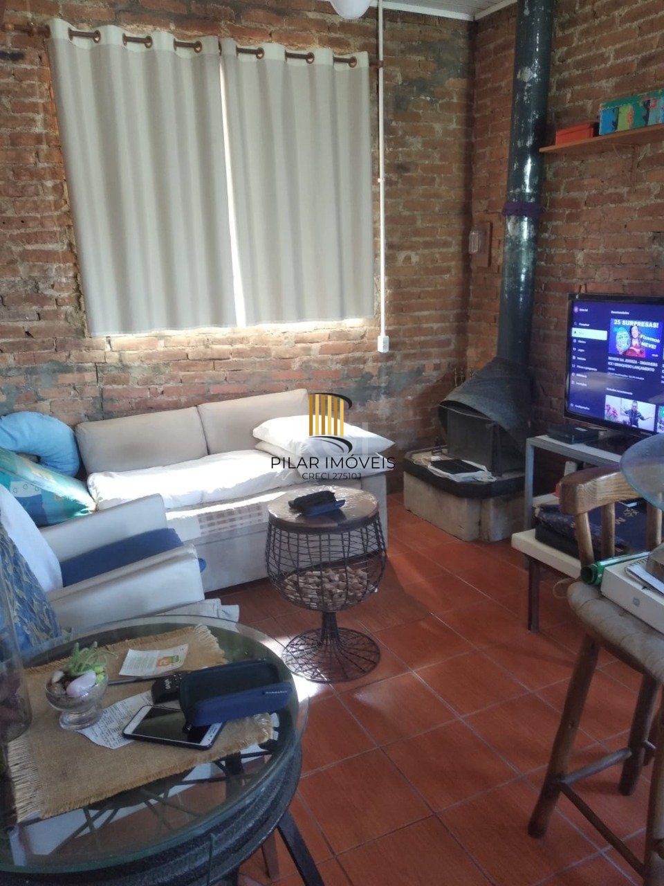 Casa 2 dormitórios, sala, banheiro garagem coberta, terreno 694m² bairro Camaquã, Porto Alegre/RS