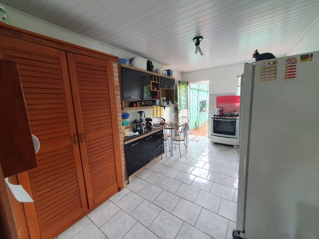 Casa de Condomínio 3 dormitórios no bairro Cristal