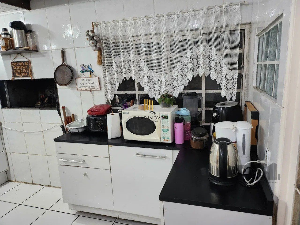  Casa com 4 quartos, 1 suíte, 7 vagas de garagem, churrasqueira -  97,32m² no bairro Jardim Carvalho, Porto Alegre/RS