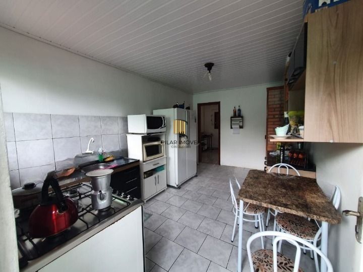 Casa de Condomínio 3 dormitórios no bairro Cristal