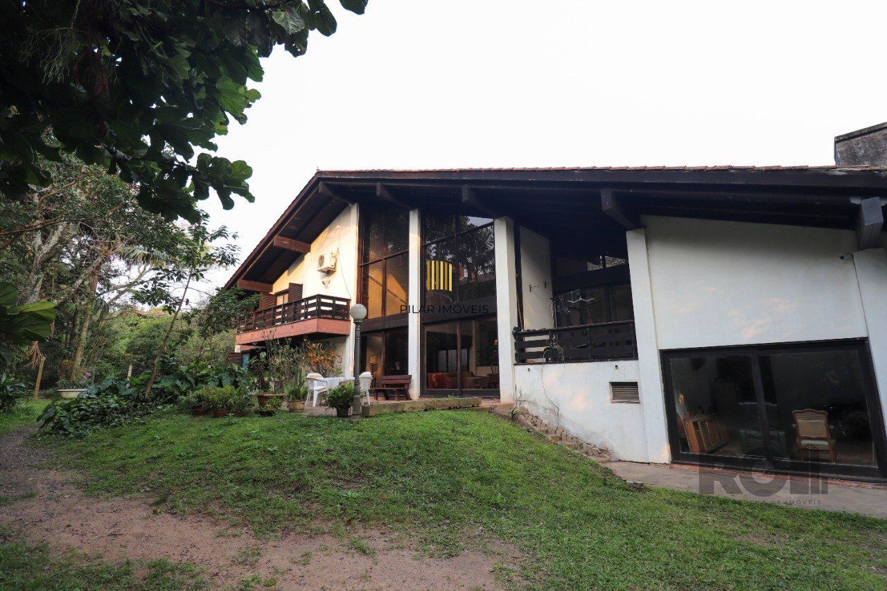 Casa para Venda - 523.36m², 6 dormitórios, sendo 2 suites, 2 vagas - Vila Conceição, Porto Alegre