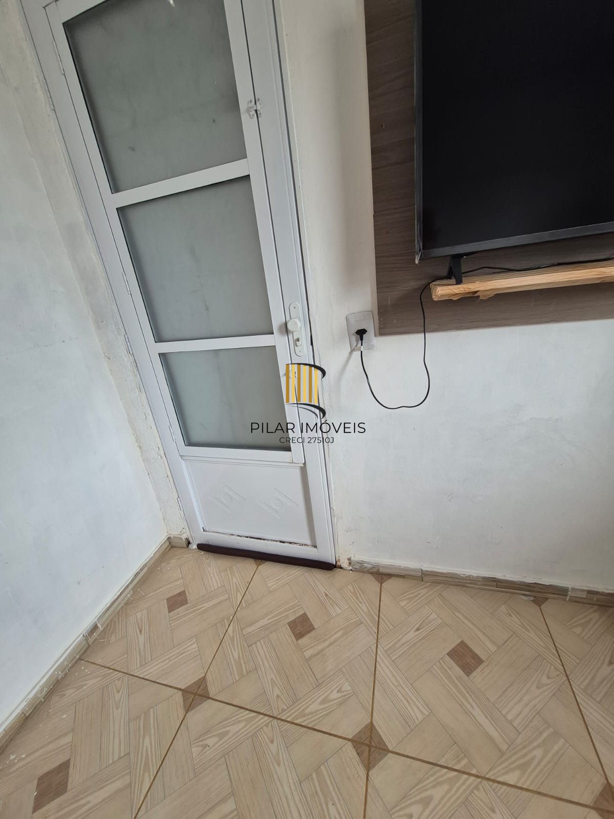 Belíssima casa de 2 dormitórios com um amplo pátio na cidade de Passo Fundo