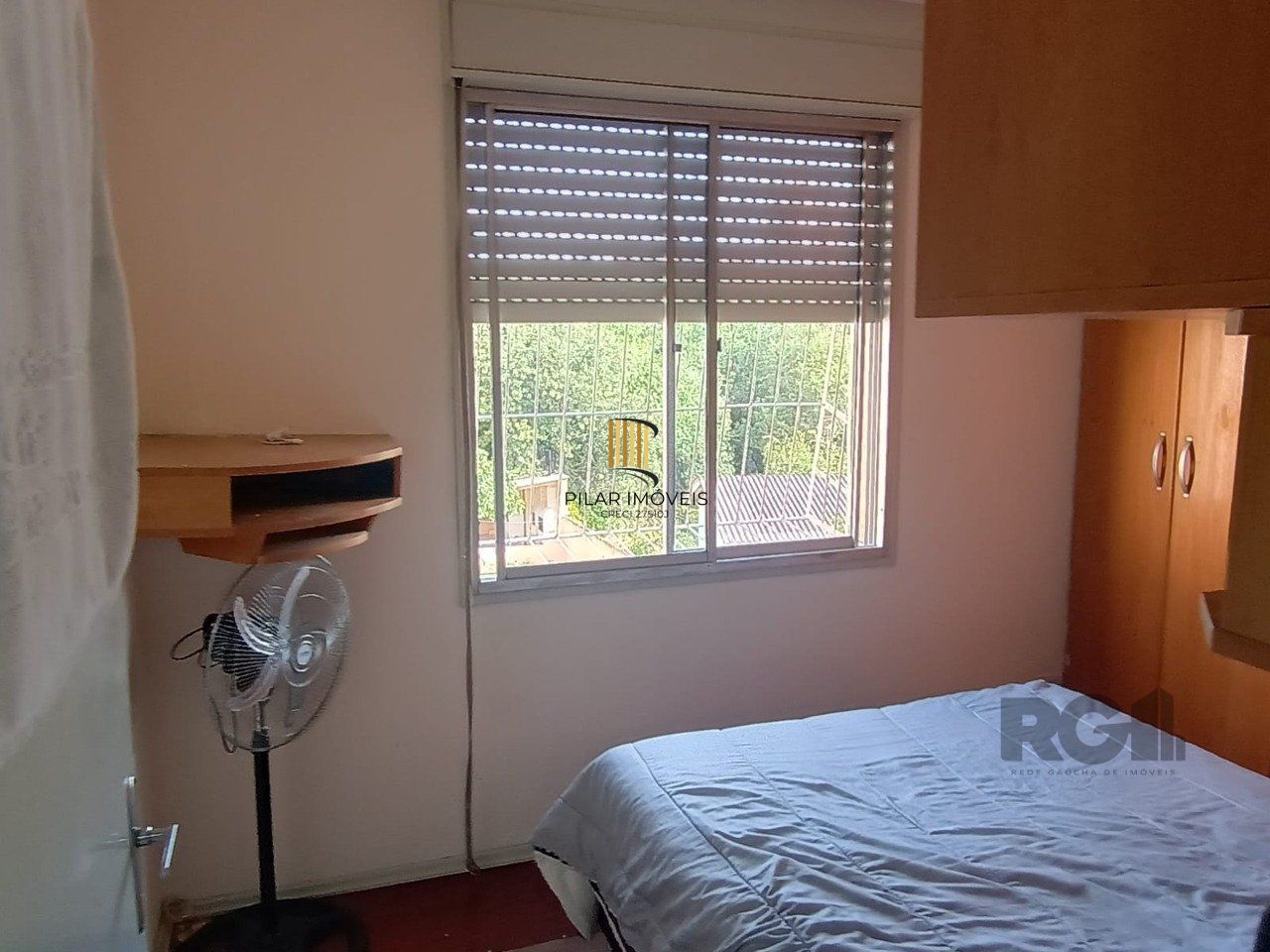 Apartamento com 2 quartos e 1 vaga no Bairro Vila Nova.
