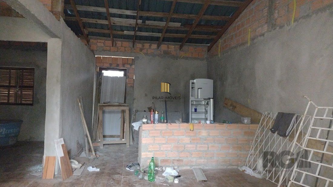 Casa de dois dormitórios localizada no Bairro Nonoai