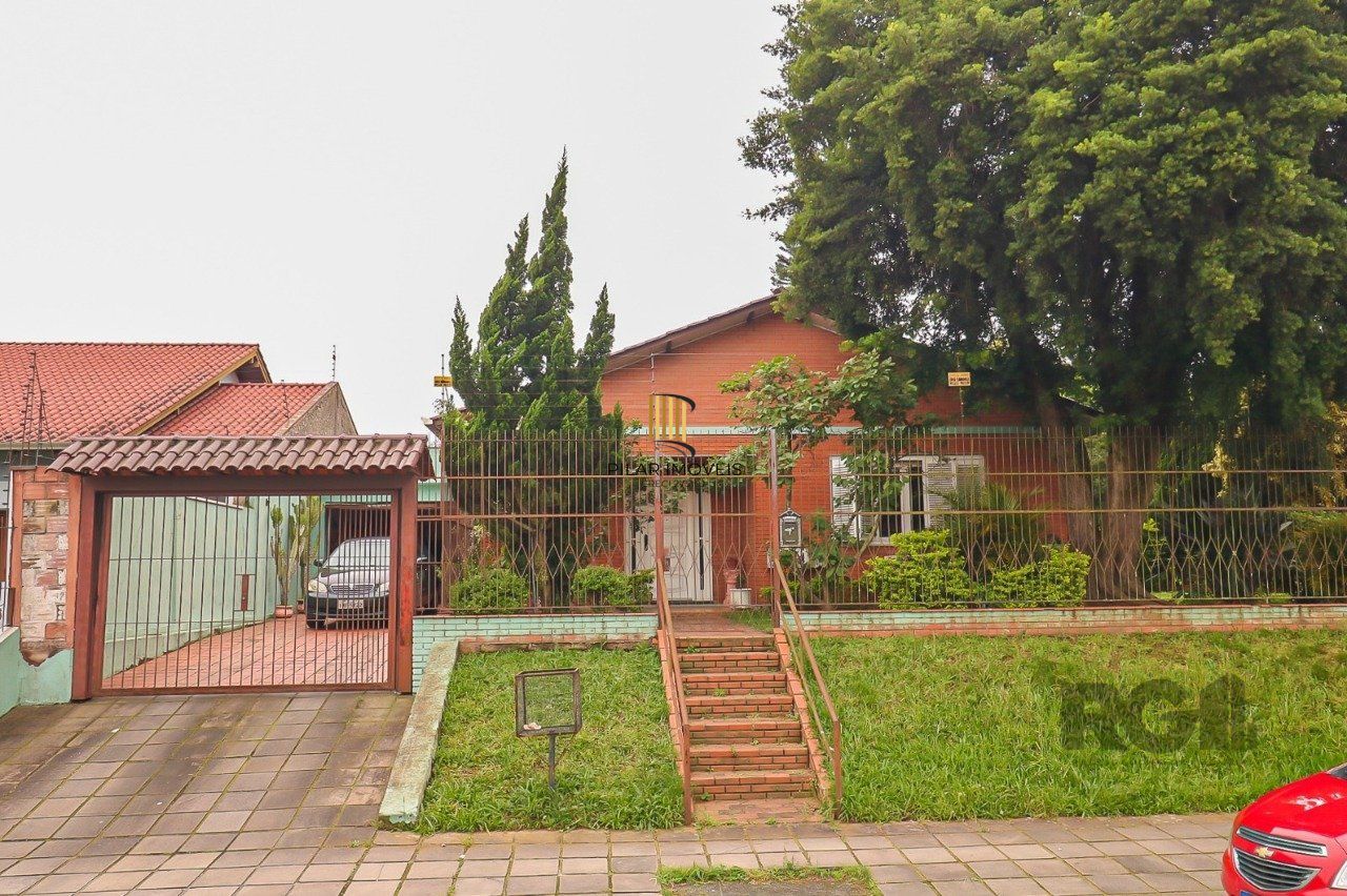 Casa com 2 quartos, vaga de garagem, churrasqueira, com 200m² privativos no centro de Esteio/RS - Pilar Imóveis