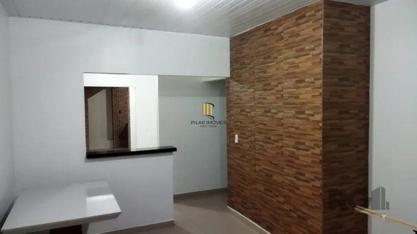 Casa 3 dormitórios no bairro Lomba do Pinheiro - Pilar Imóveis