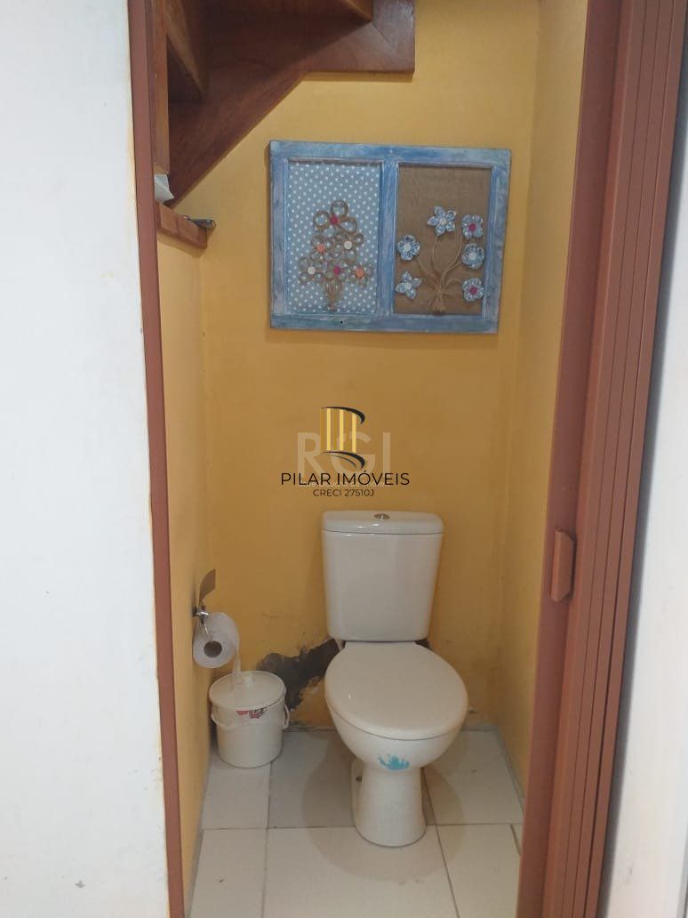 Casa com 2 quartos, banheiro, área de serviço, cozinha, vaga de garagem, no bairro Aberta dos Morros/RS