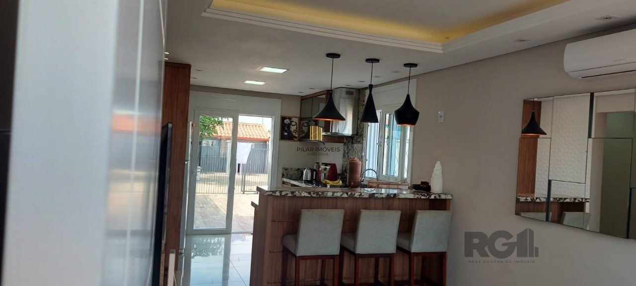 Casa com 2 dormitórios, sendo 1 suíte no bairro Florida em Guaíba