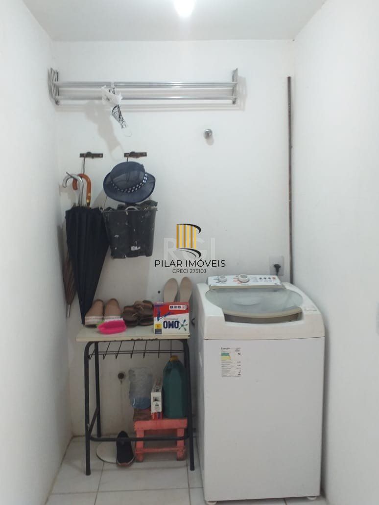 Casa com 2 quartos, banheiro, área de serviço, cozinha, vaga de garagem, no bairro Aberta dos Morros/RS