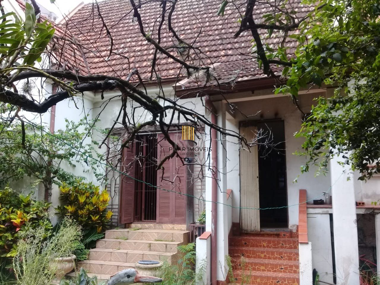 Casa de 4 dormitórios na Av. Teresópolis bairro Teresópolis