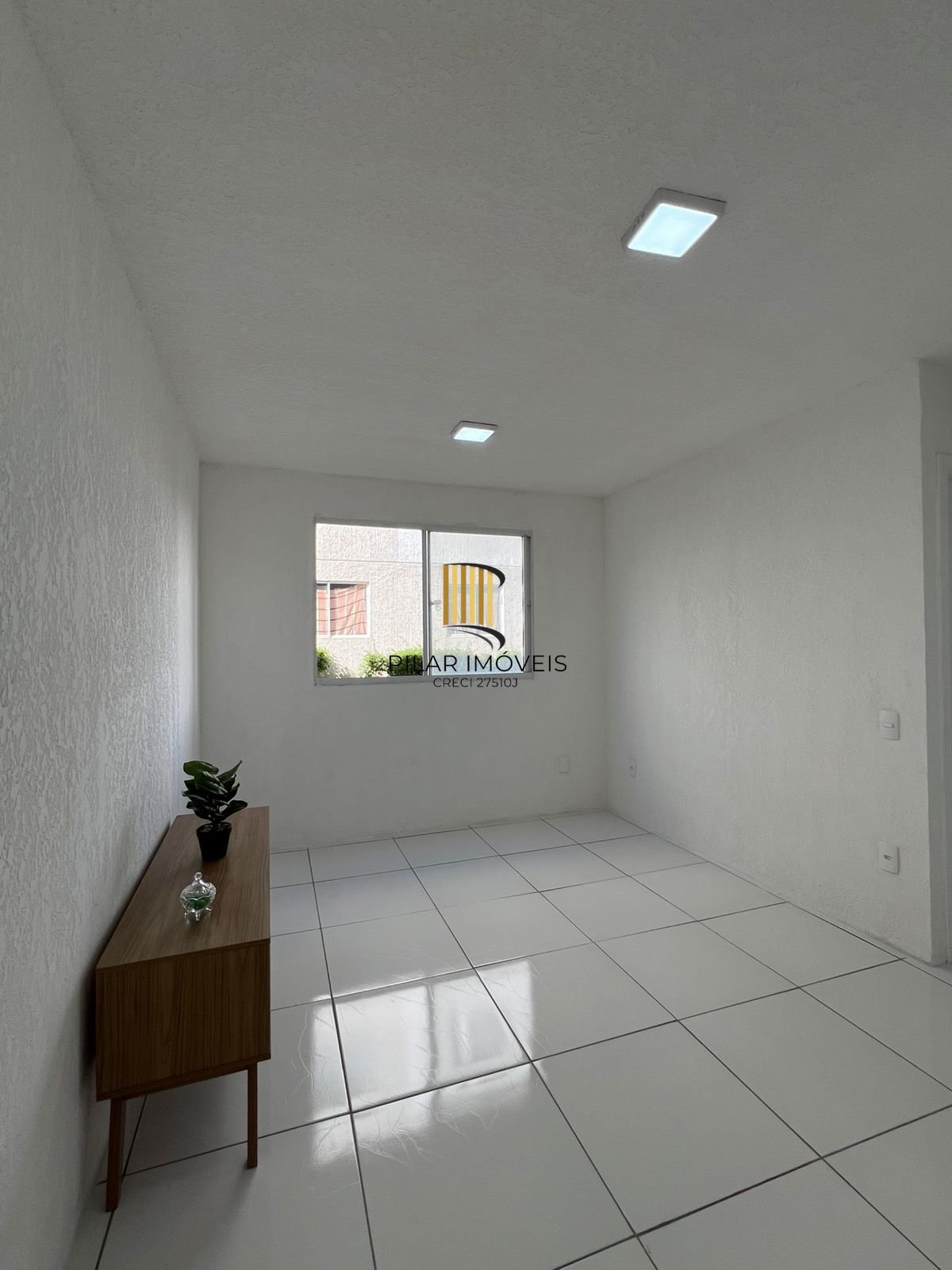 Apartamento Térreo com 02 quartos e 01 vaga no Bairro Restinga em Porto Alegre