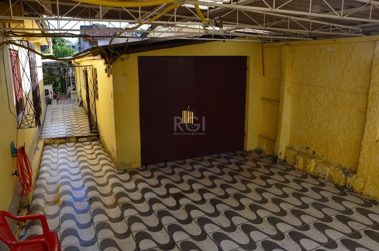 Casa Com 5 dormitórios no Bairro Partenon - Pilar Imóveis