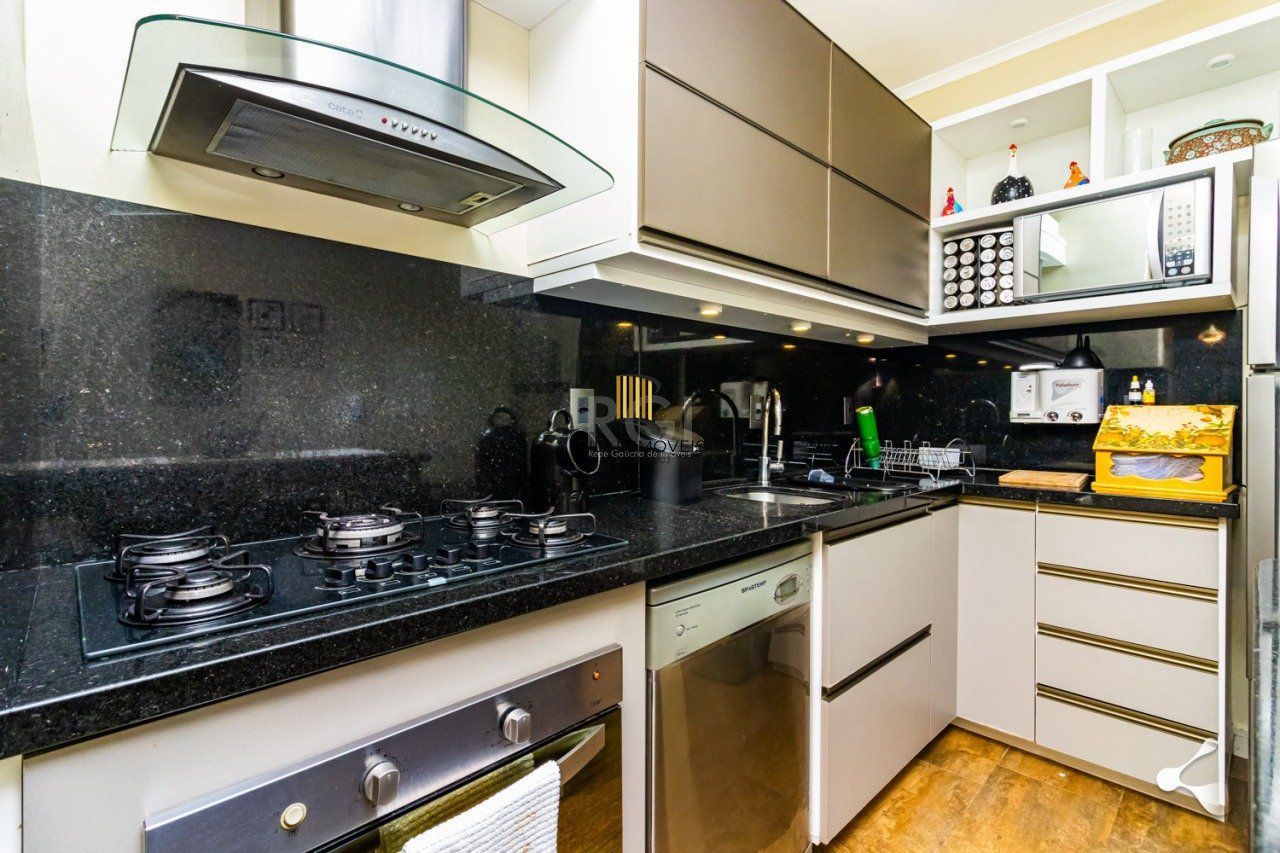 CASA 4 DORMITÓRIOS COM GARDEM NO GUARUJA - PORTO ALEGRE - RS