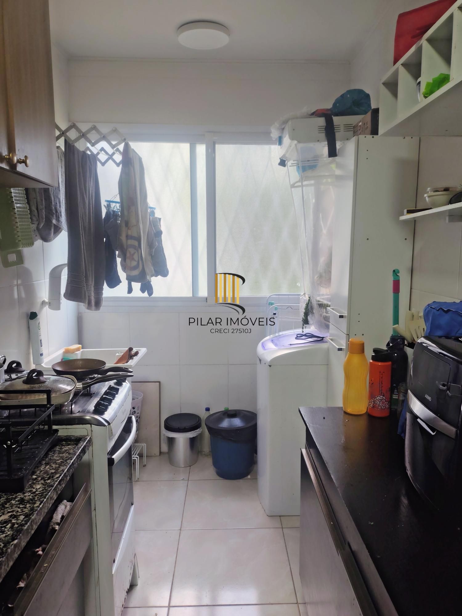 Apartamento dois dormitórios com vaga rotativa Santo Antônio - Porto Alegre